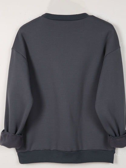 Sweatshirt med hjärttryck – Lekfull komfort med kärleksfull stil