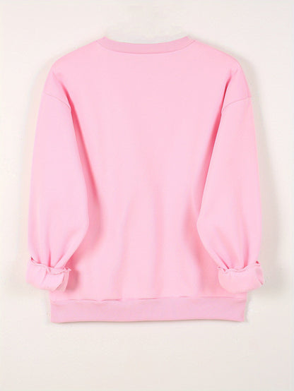 Sweatshirt med hjärttryck – Lekfull komfort med kärleksfull stil