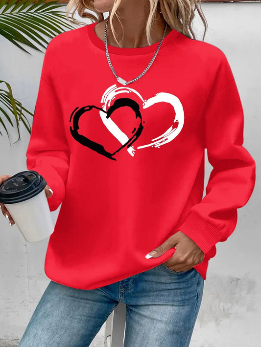 Sweatshirt med hjärttryck – Lekfull komfort med kärleksfull stil