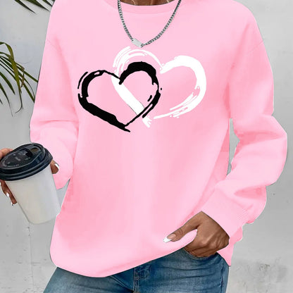 Sweatshirt med hjärttryck – Lekfull komfort med kärleksfull stil